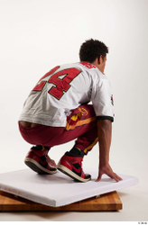 Man Black Sports Pants Athletic Kneeling Studio photo references